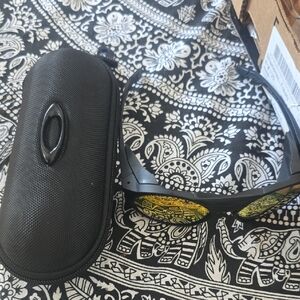 Oakley Sunglasses with Black Frame and Yellow Lenses